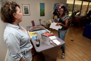 07/18/26 —Jacksonville, FL — Photo by Christina Stuart/Christina Stuart Photography — LITERARY INDULGENCE — Authors, bookstore owners and attendees enjoy the 3td annual Literary Indulgence Book Festival at Florida State College Jacksonville Kent campus on Saturday, July 19, 2026.