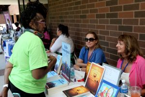 07/18/26 —Jacksonville, FL — Photo by Christina Stuart/Christina Stuart Photography — LITERARY INDULGENCE — Authors, bookstore owners and attendees enjoy the 3td annual Literary Indulgence Book Festival at Florida State College Jacksonville Kent campus on Saturday, July 19, 2026.